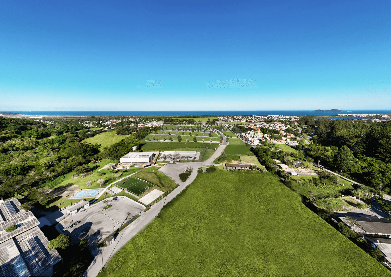 Image of the Rio Tavares neighborhood with a button to open the video box